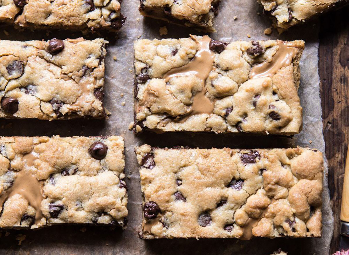 Chocolate chip and peanut butter swirled cookie bars recipe from Half Baked Harvest