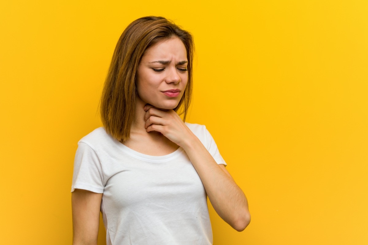 woman with sore throat