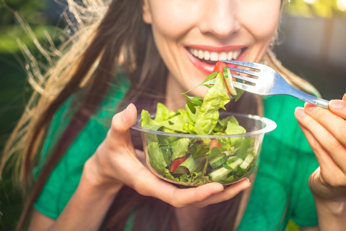 woman eating a salad