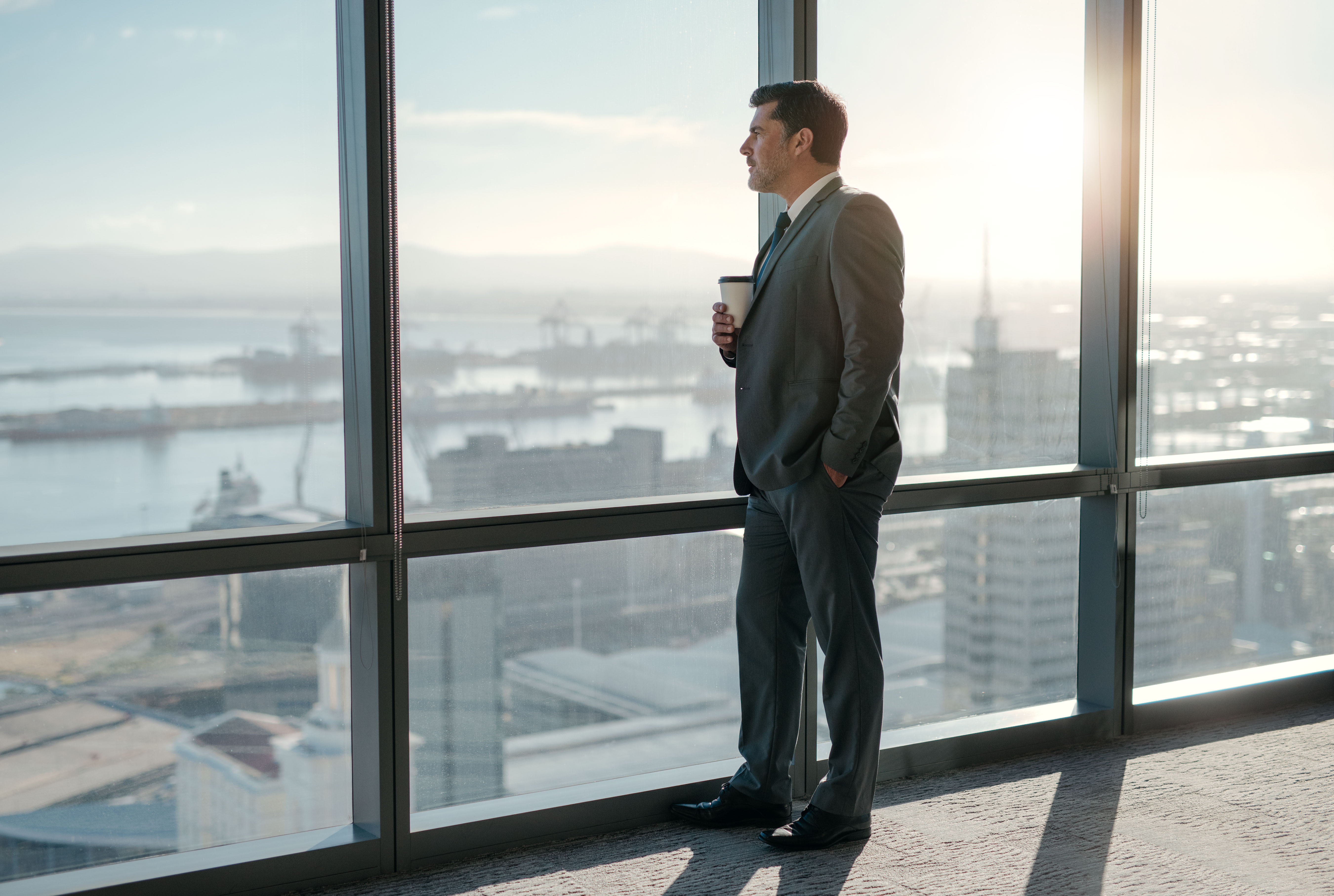 Businessman Looking out the Window