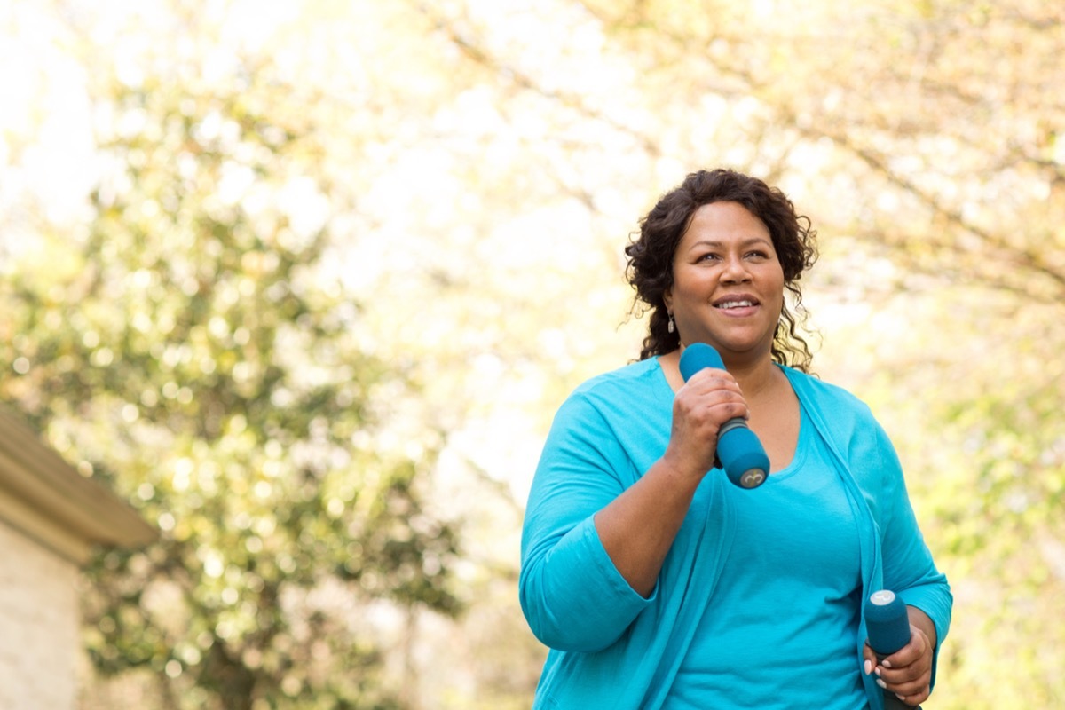 mature black woman exercising outdoors