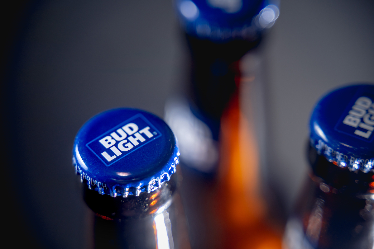 Closeup cap of bottles Bud Light beer. Bud Light was introduced in 1982 by Anheuser-Bucsh InBev., the top selling beer in the United States