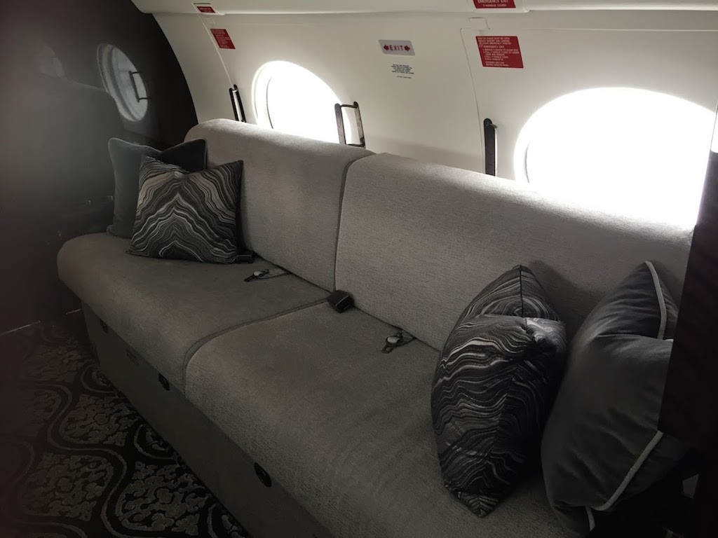 couch in private jet, photo by Diana Bruk.