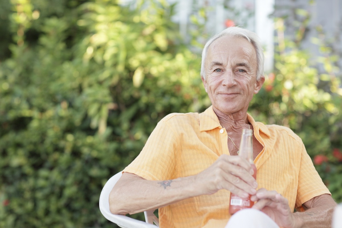 Older man drinking some sugary soda