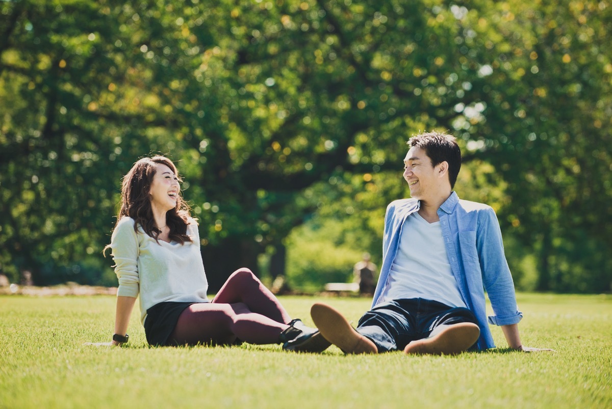 Asian man and woman in park