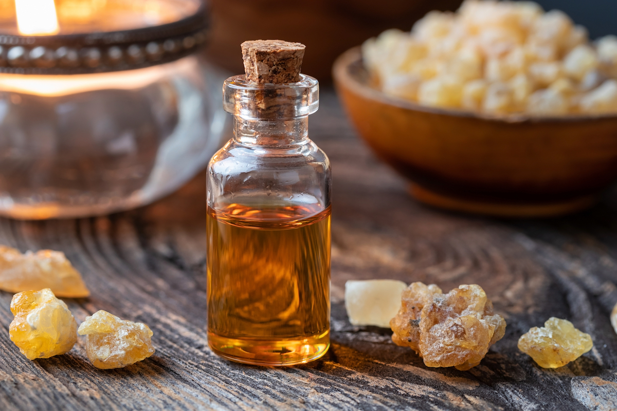 A,Bottle,Of,Essential,Oil,With,Frankincense,On,A,Table