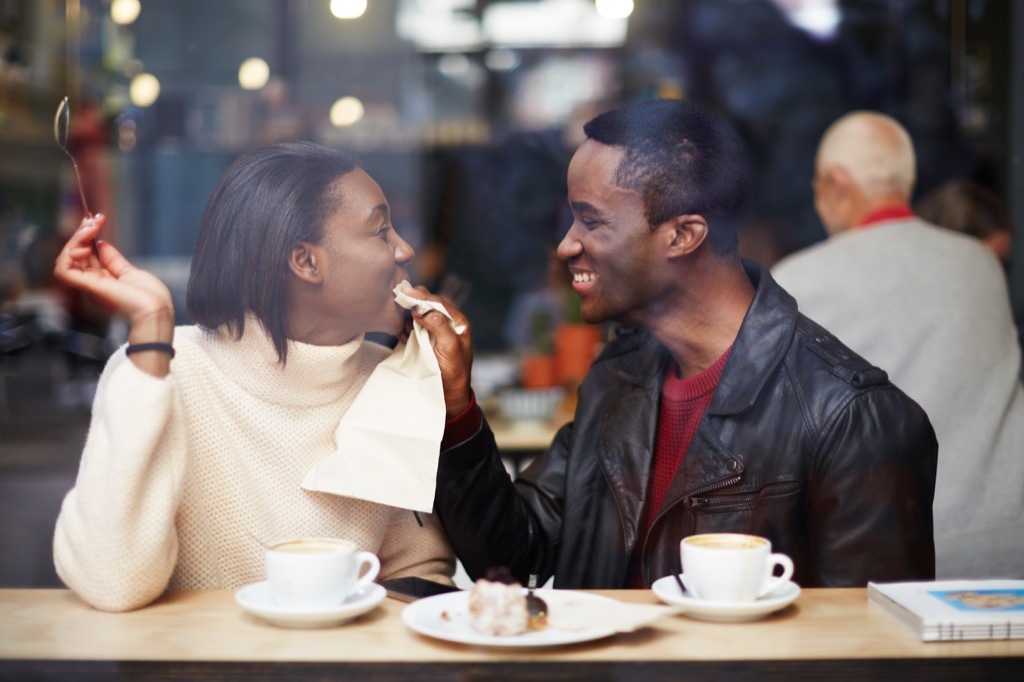 couple on a romantic date in a coffee shop