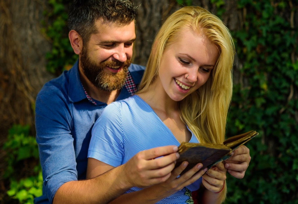 Man Reading Poems to Woman