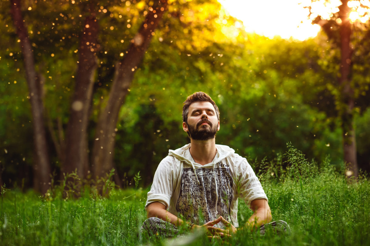 Man Meditating Outside