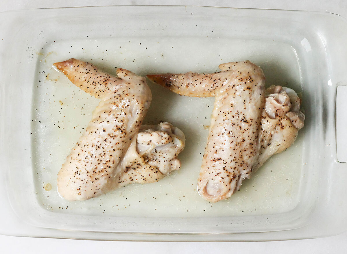 Baked turkey wings halfway through the cooking process