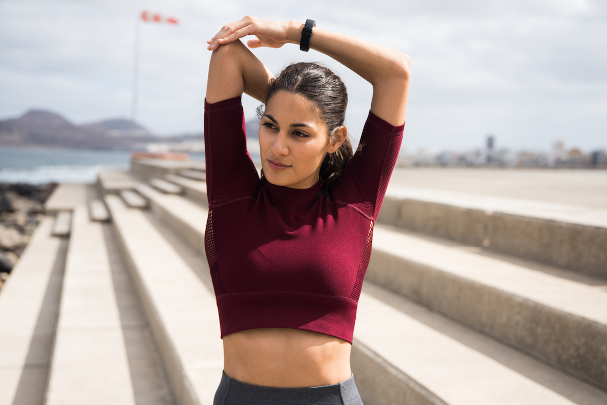 Pretty,Young,Brunette,Working,Out,On,Stairs,With,Her,Arms