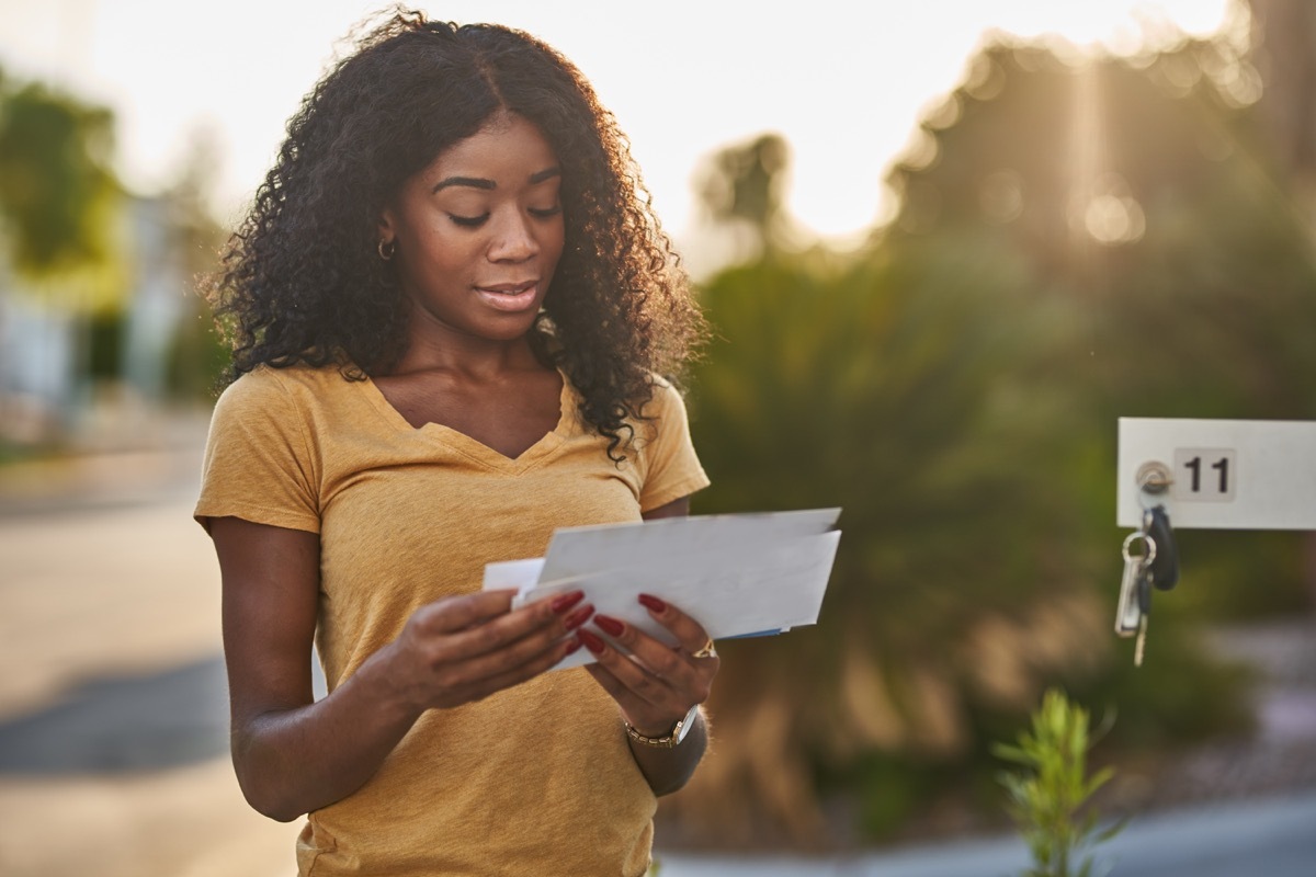 woman checking mail in las vegas community