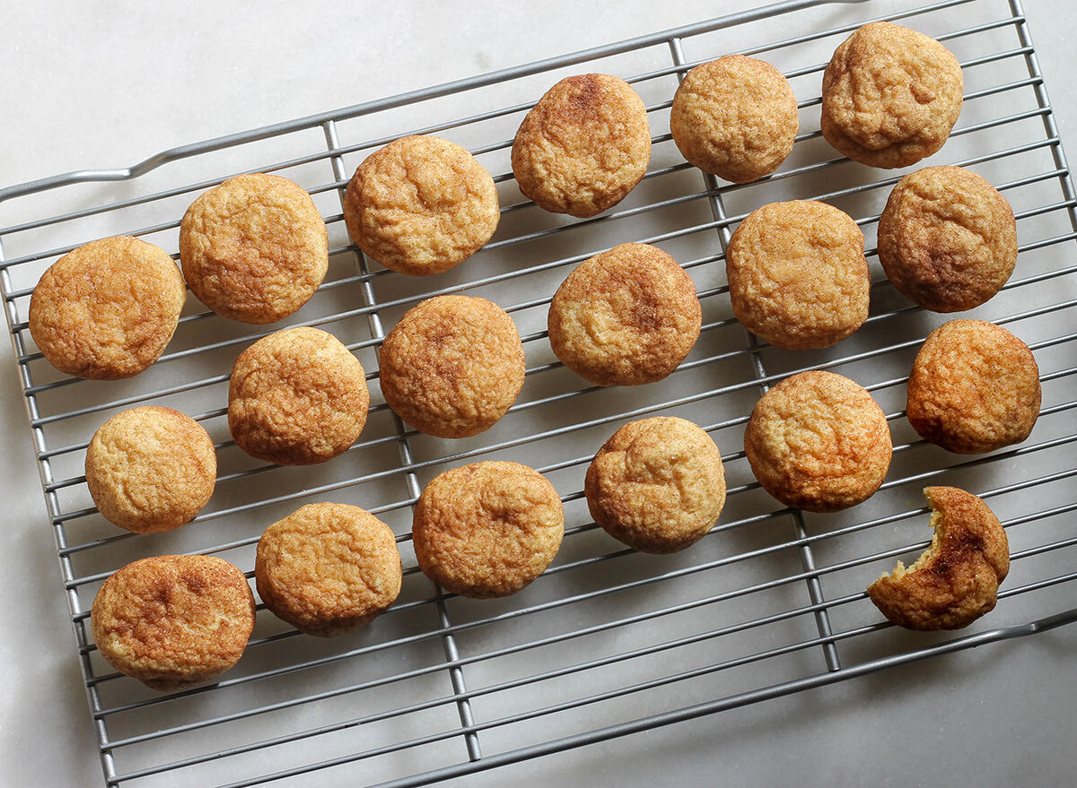 baked snickerdoodle cookies on a cooling rack