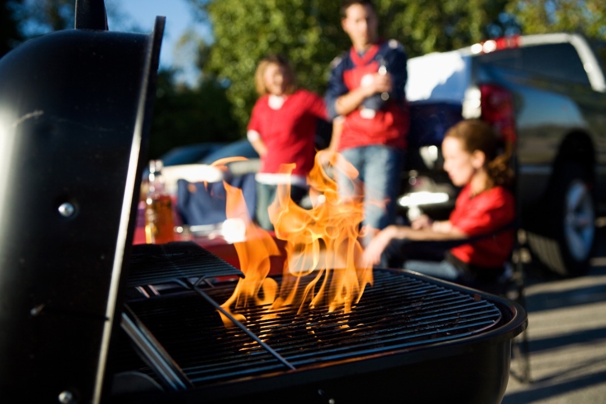 Friends grilling and tailgating