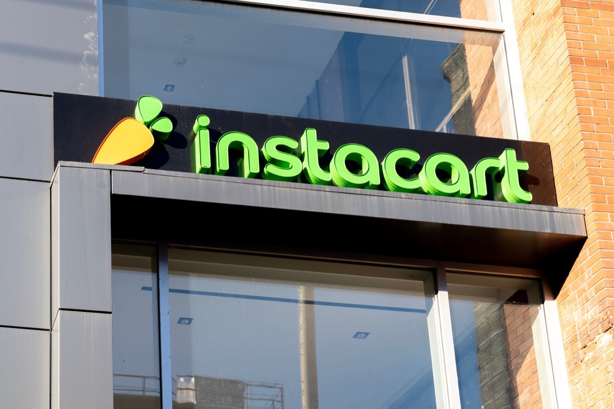 Toronto, Canada- November 14, 2020: Instacart company closeup sign is seen in Toronto, Canada. Instacart is an American company that operates a grocery delivery and pick-up service.