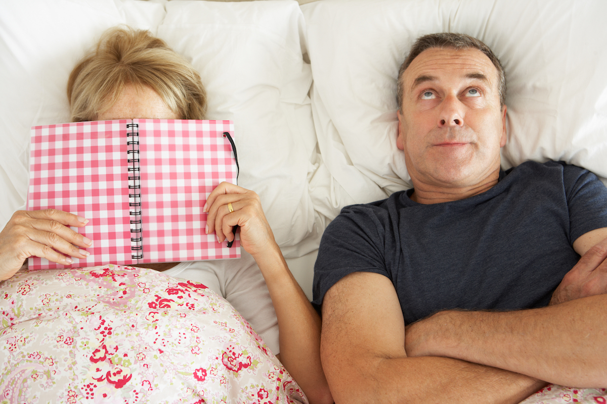 Married couple bored in bed