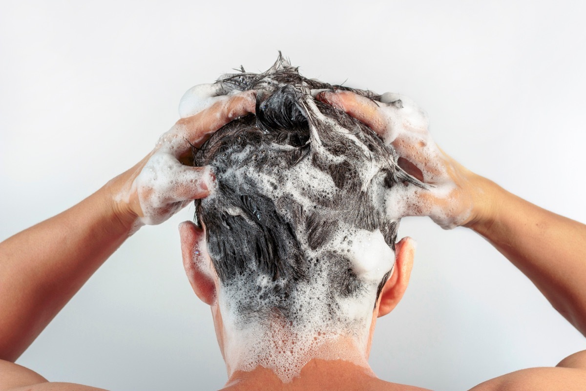 man washing hair