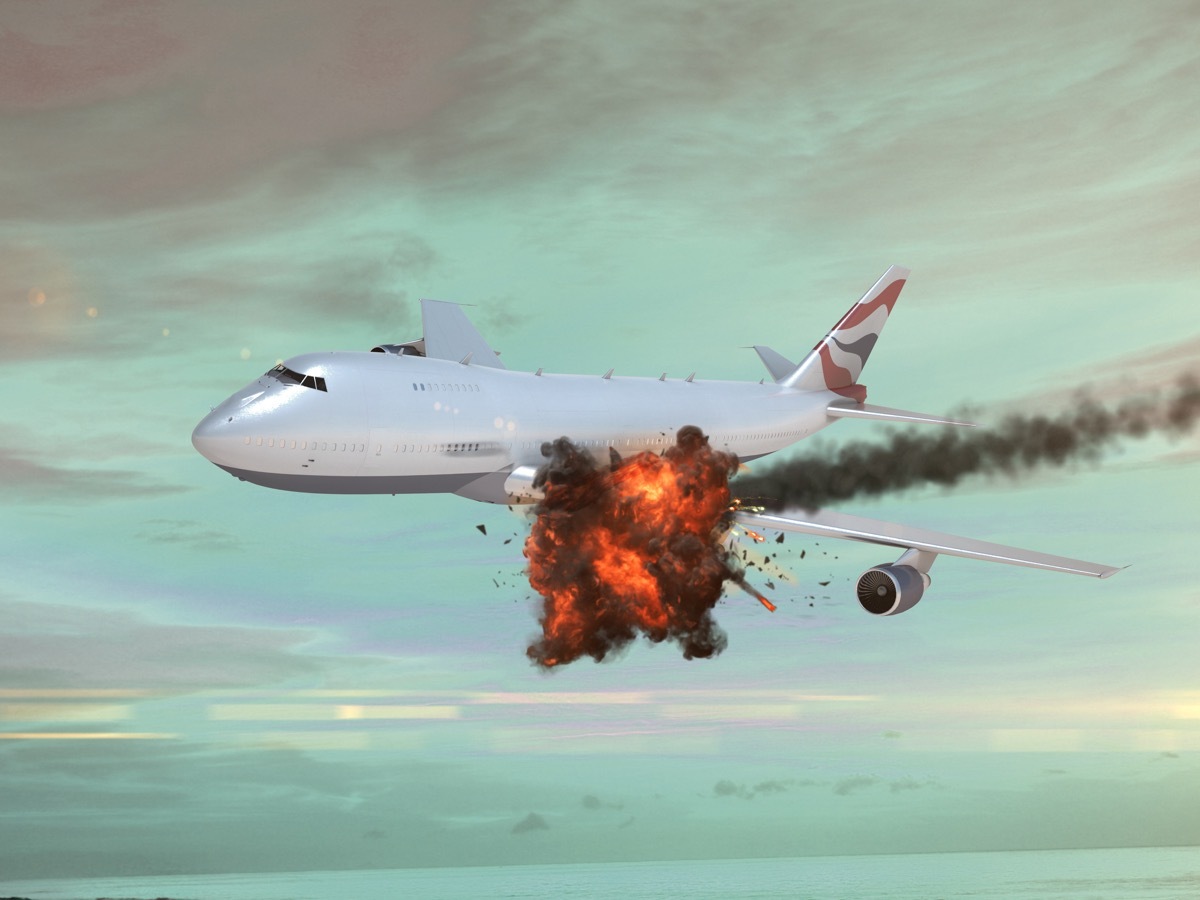 Airplane with an explosion in the sky