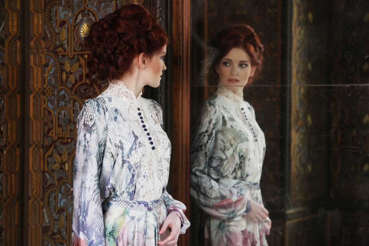 woman wearing a victorian ball gown