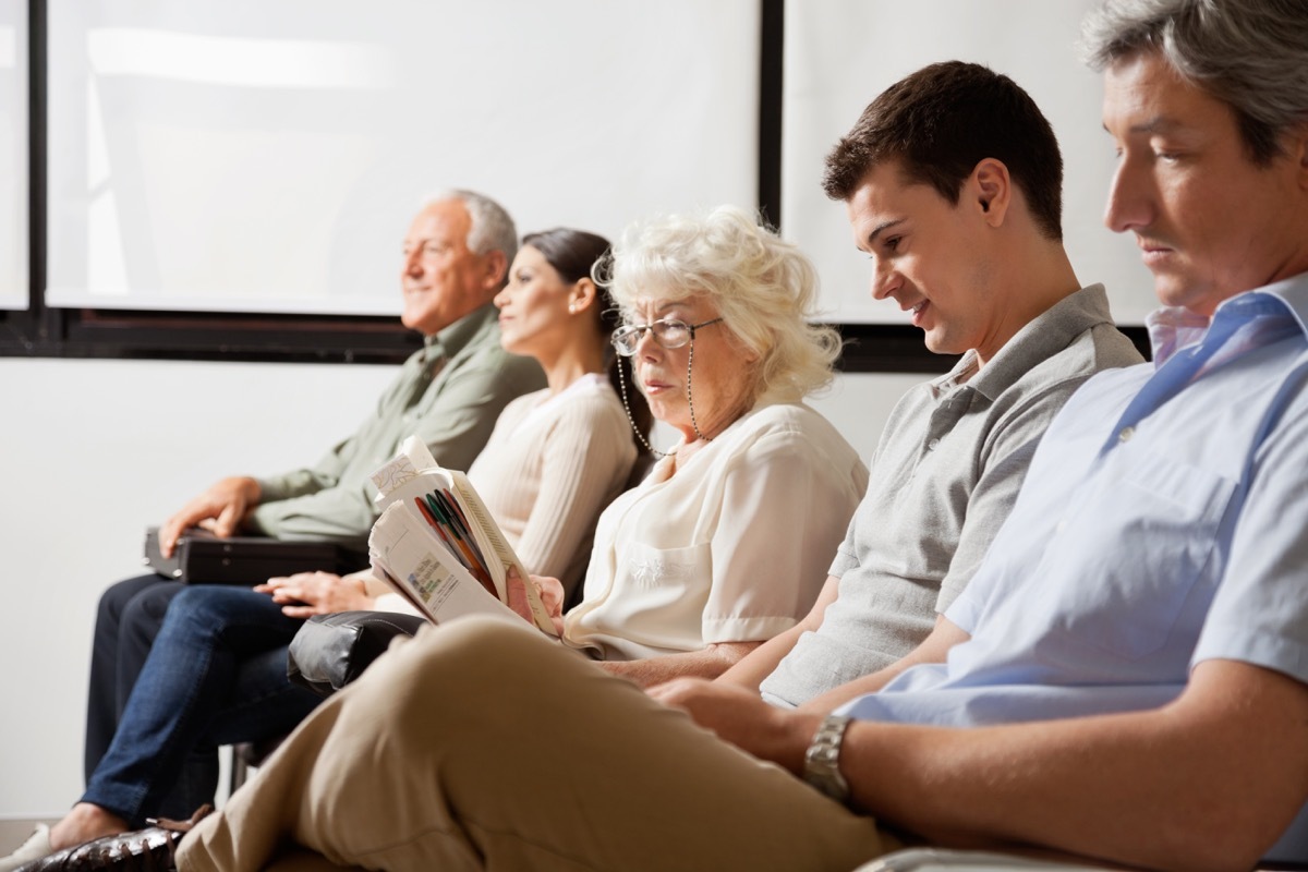 row of people in a doctor's office