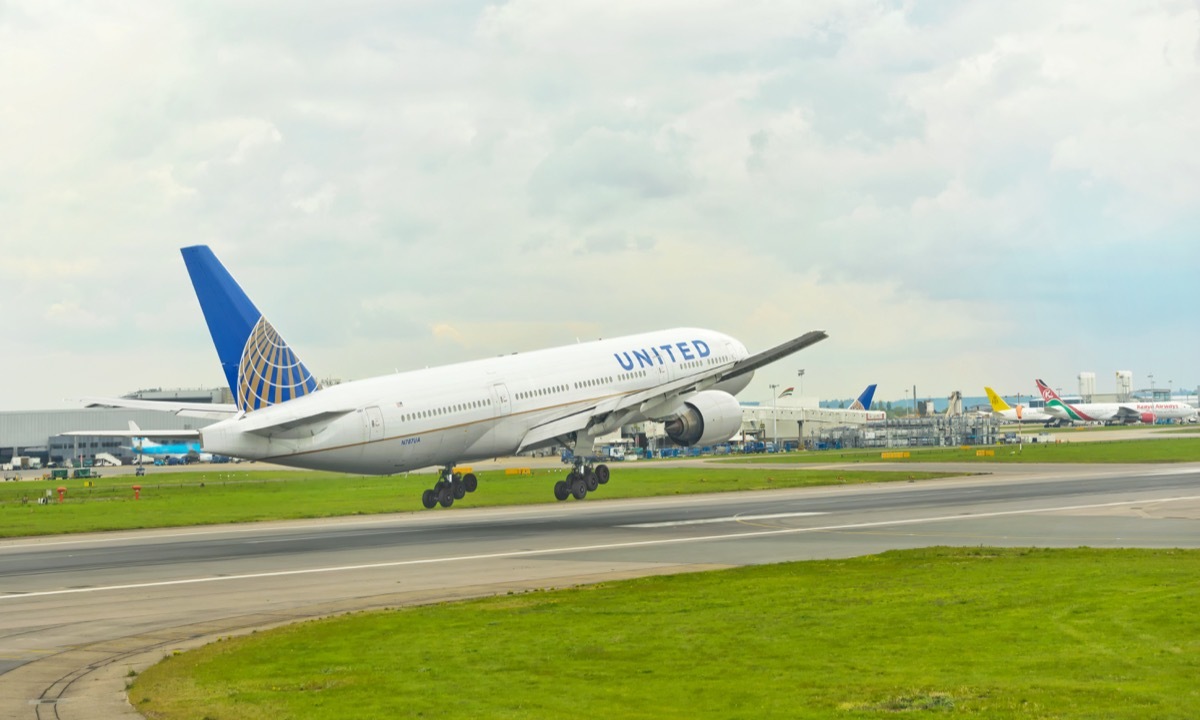 London Heathrow, United Kingdom - April 22, 2014 : United Airlines Boeing 777 moments from touch-down at London Heathrow Airport.