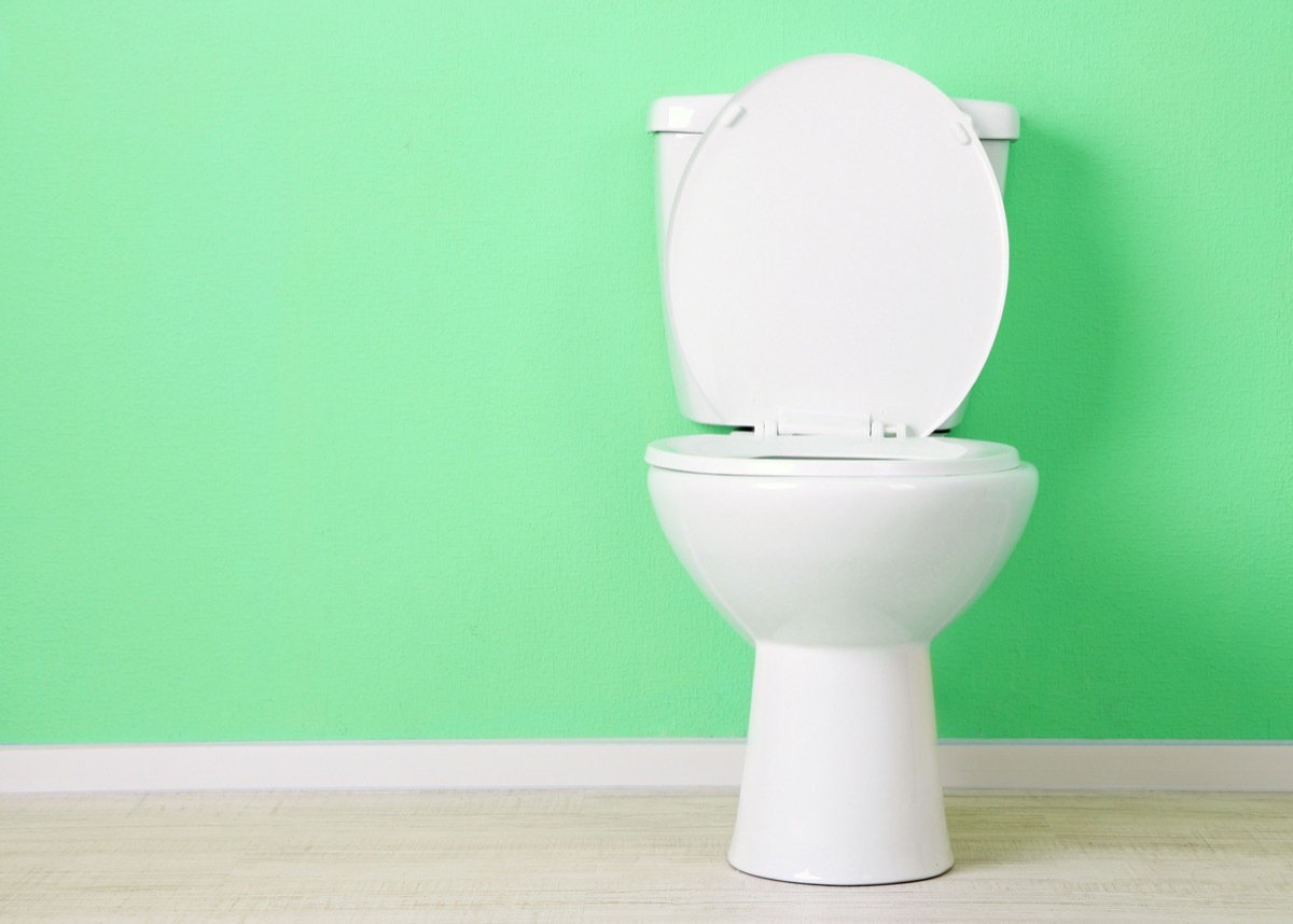 toilet against a sea green wall, diy hacks