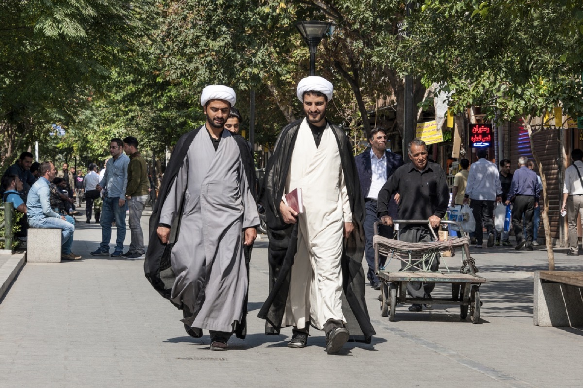 two mullahs walking together in iran