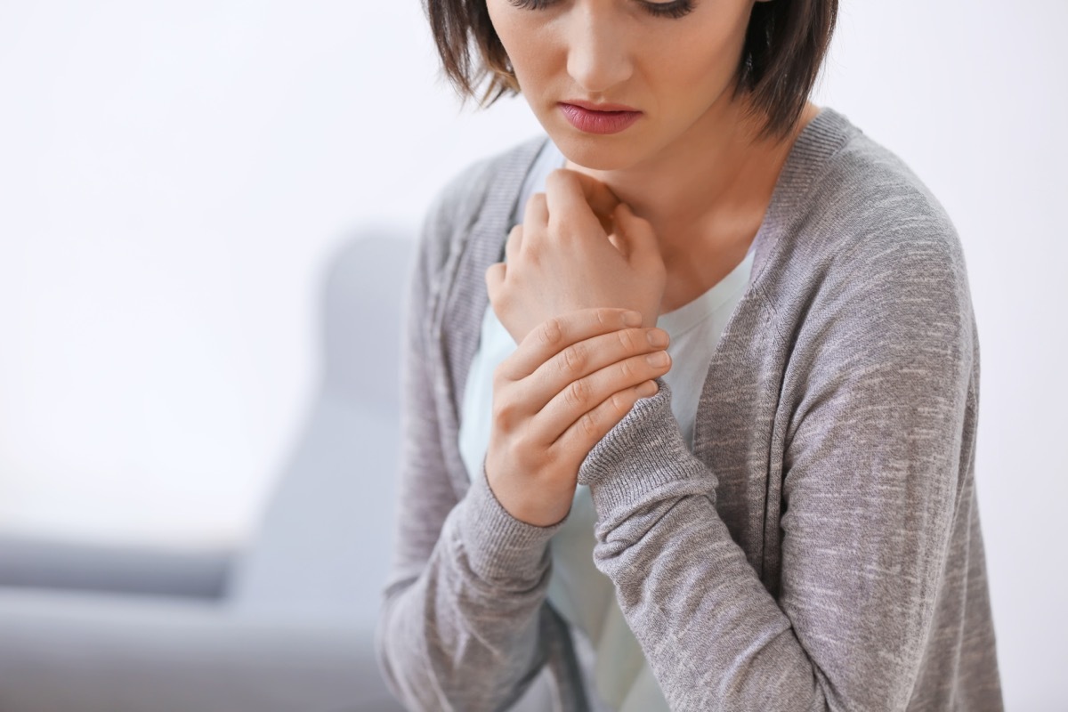 Woman with Chronic Pain in Her Wrists