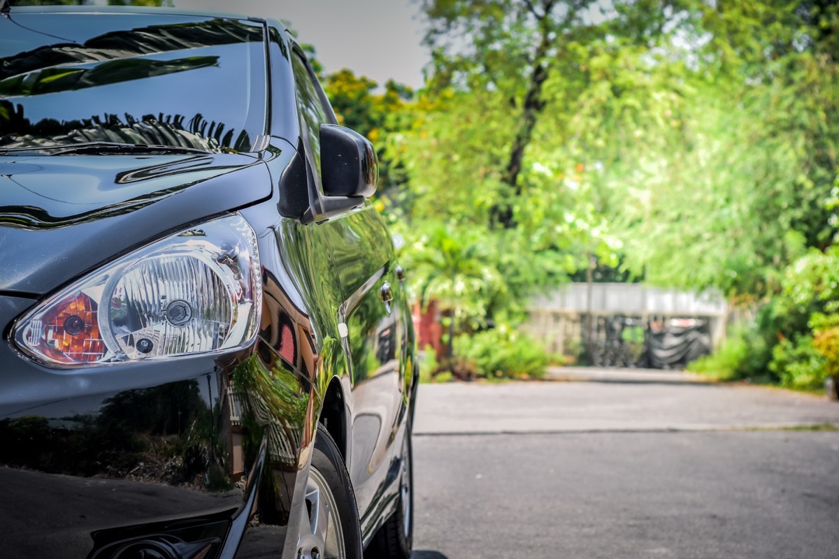 a parked car in the street, safety tipcs