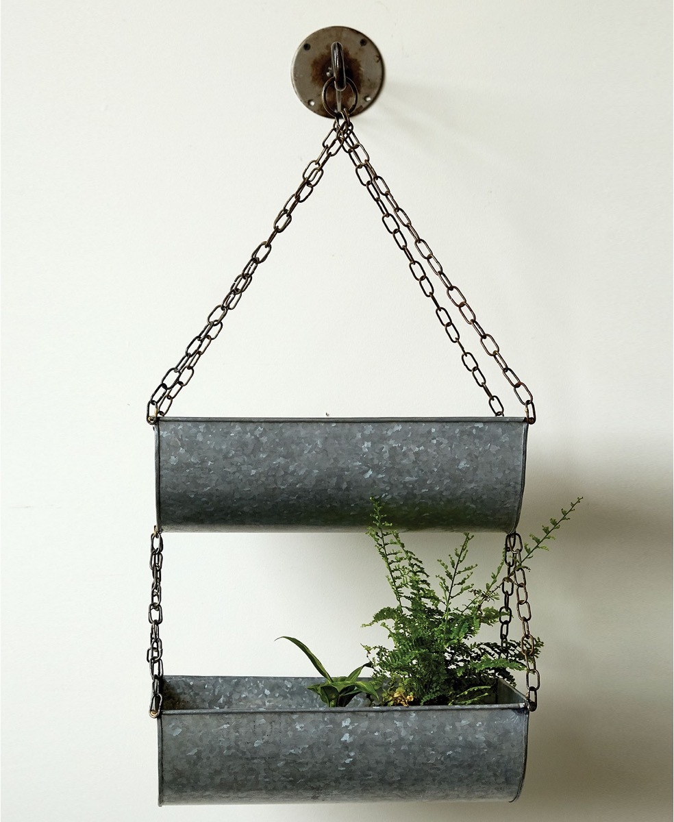 metal hanging shelf with a plant in it, rustic farmhouse decor