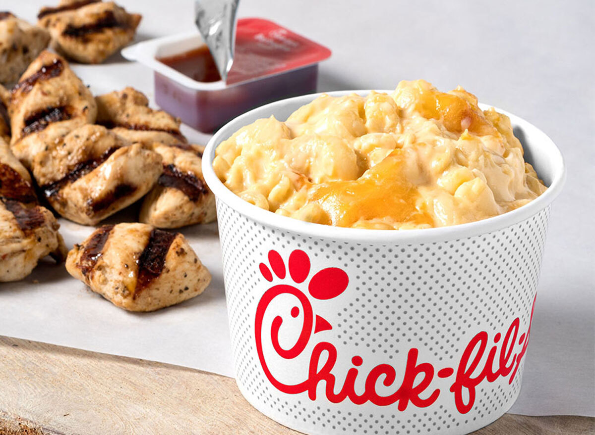 Chick fil a mac and cheese with grilled nuggets in background