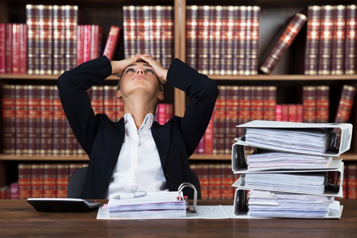 Close-up Of A Young Stressed Female lawyer