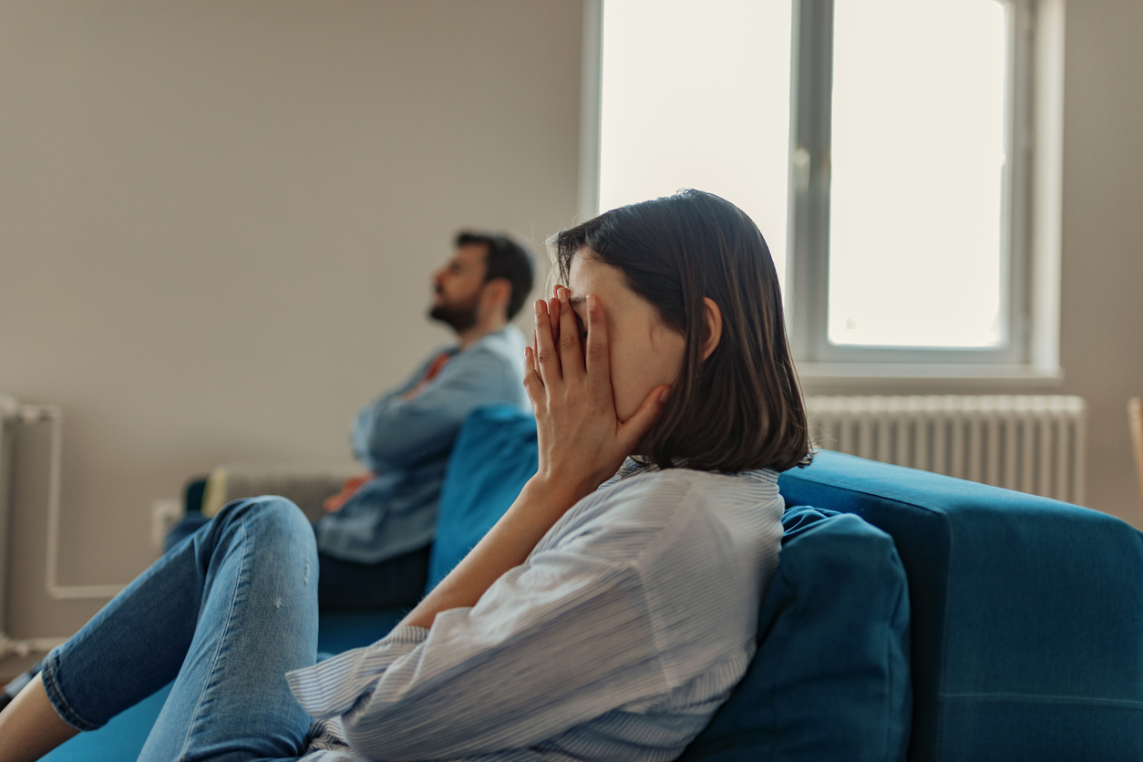 Unhappy Couple After an Argument in the Living Room