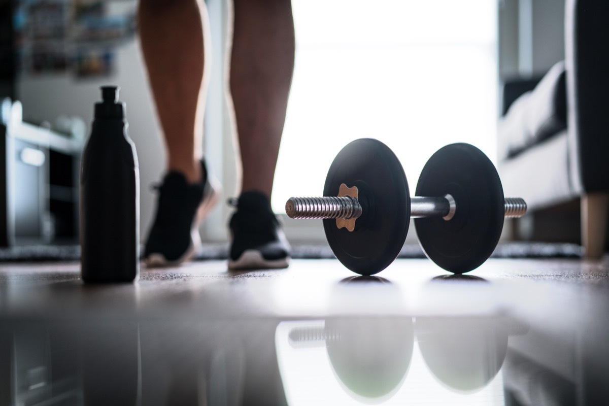 Woman about to lift weight