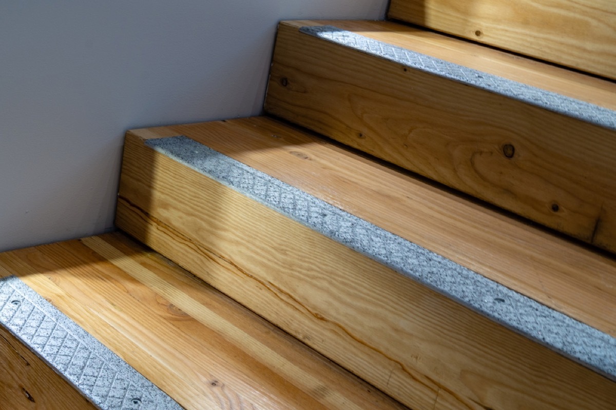 wooden stairs with gray treads