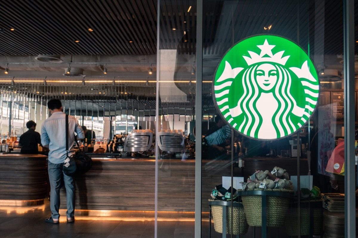 Starbucks coffee logo in front of the shop