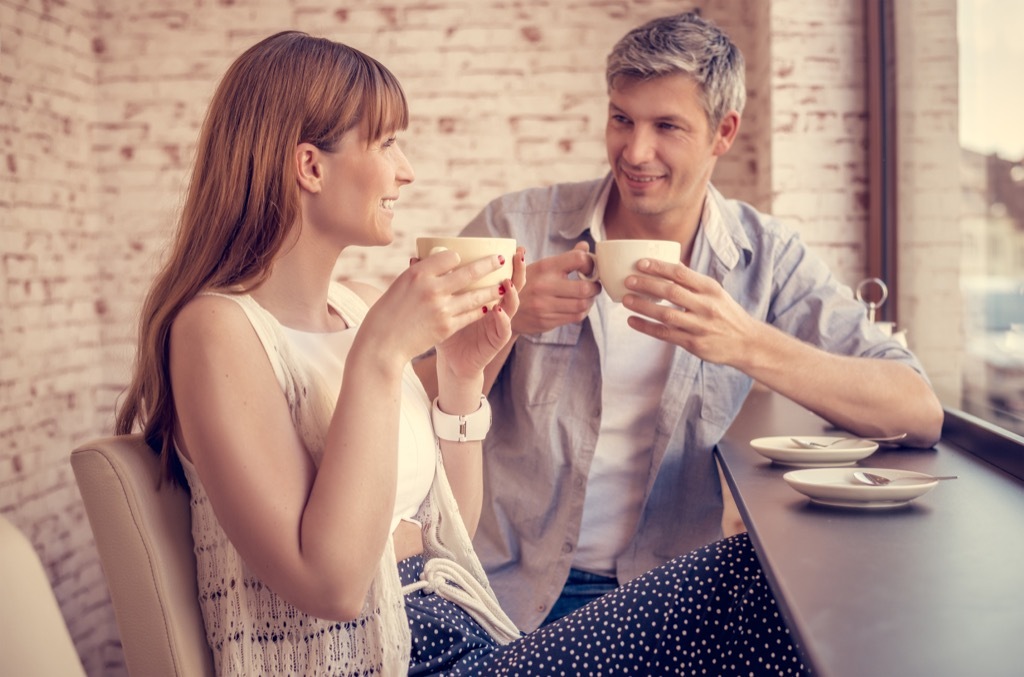 couple on a date- body language signs of attraction 