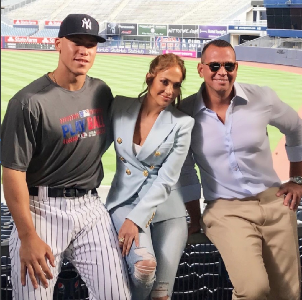 Alex Rodrigues and Jennifer Lopez at a baseball game.