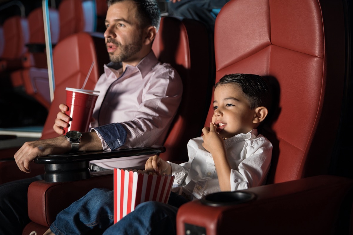 Father and son at the movie theatre