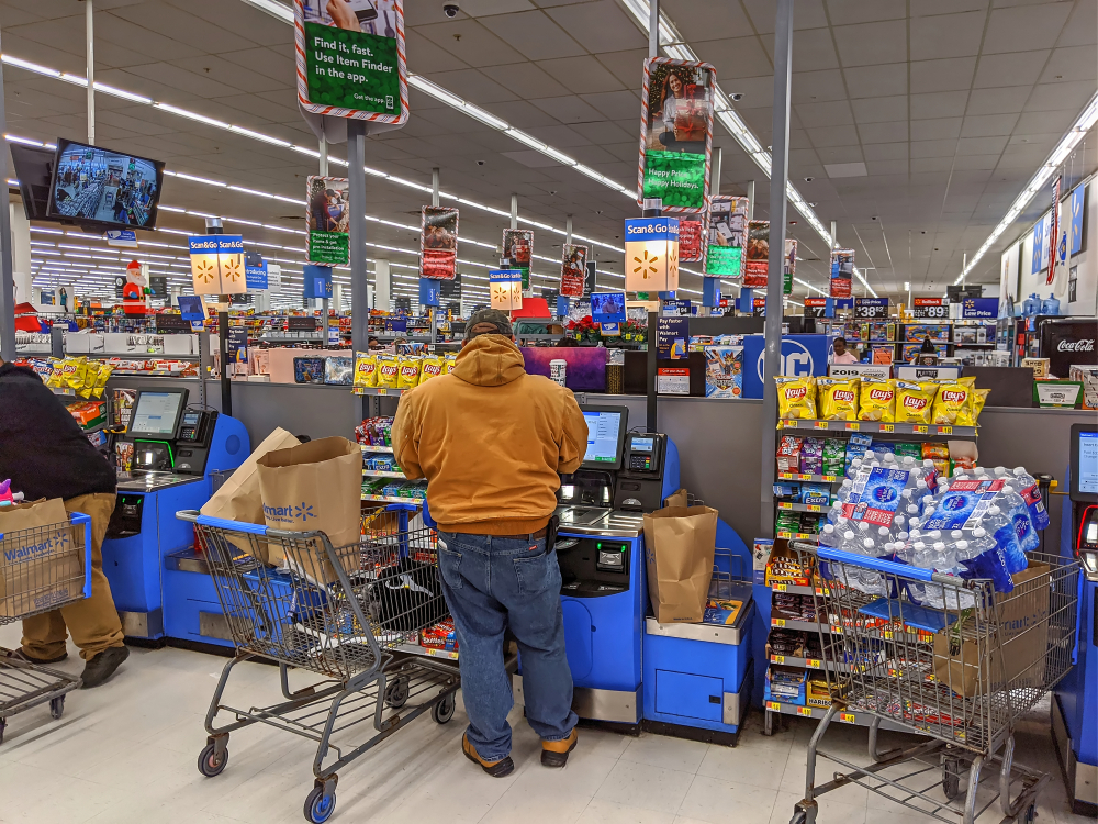 A self-checkout kiosk at a Walmart store