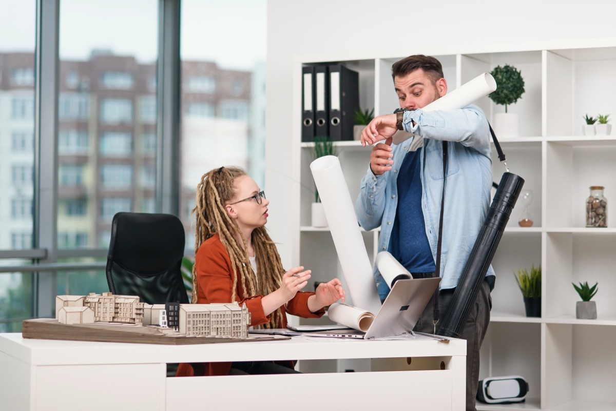 Man Dropping Things on Colleague