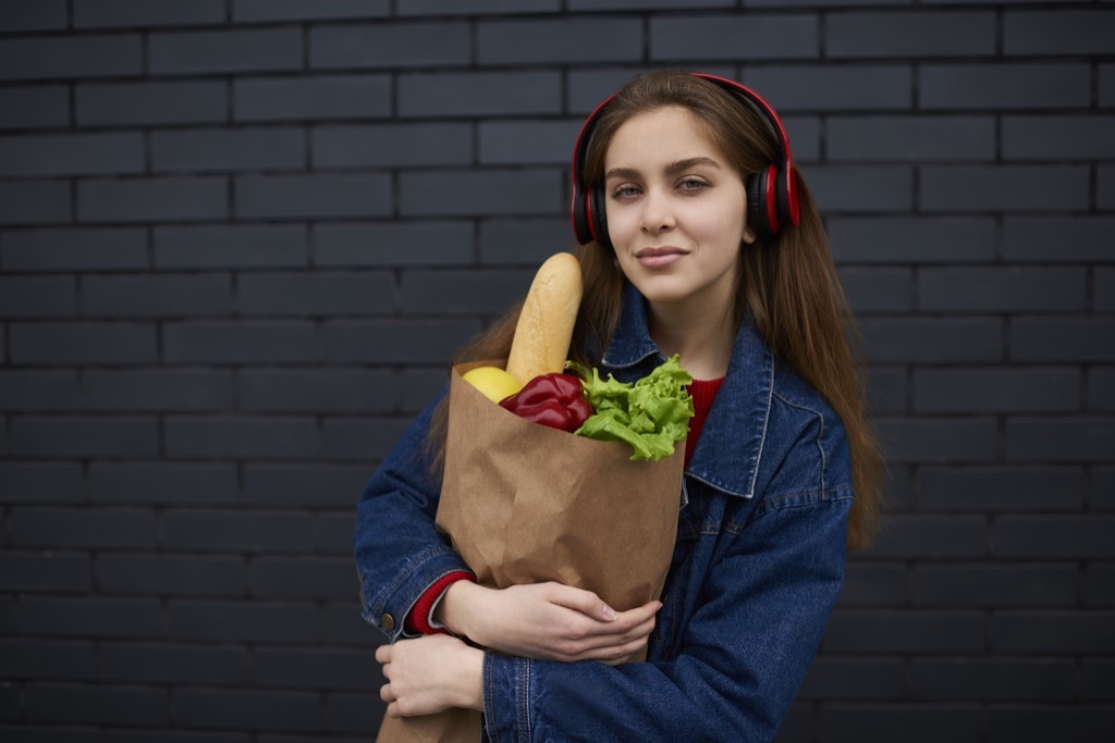 Woman Listening to Music While Grocery Shopping Mistakes