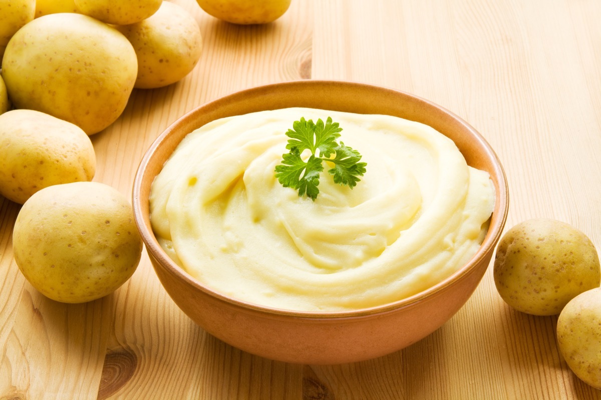 bowl with mashed potatoes, garnish, potatoes