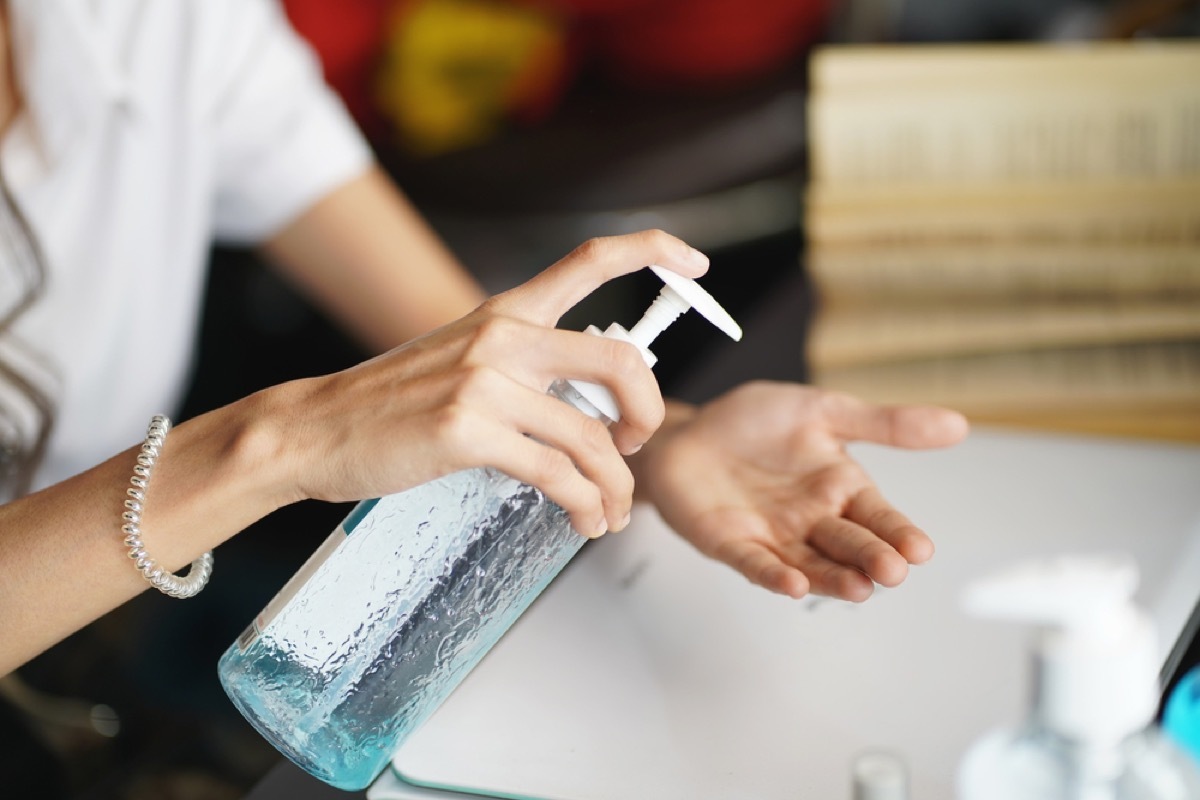 close up of woman's hands using gel soap