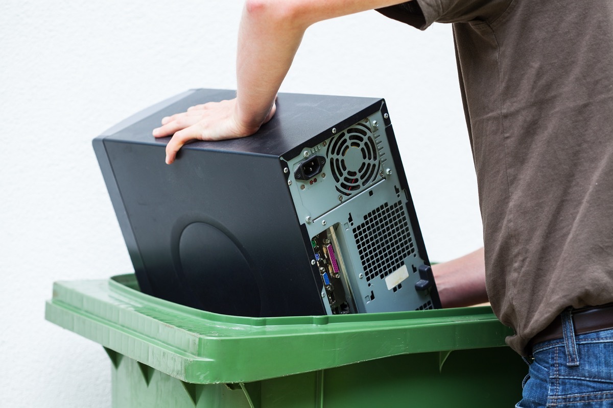 Man throwing out electronic