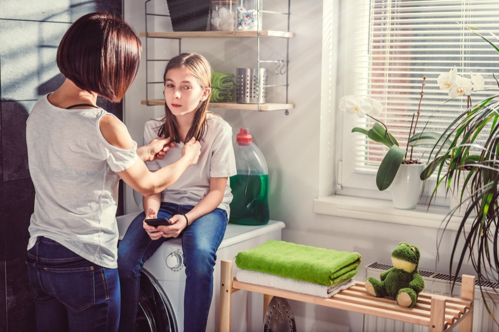 mom helping sad daughter, skills parents should teach kids