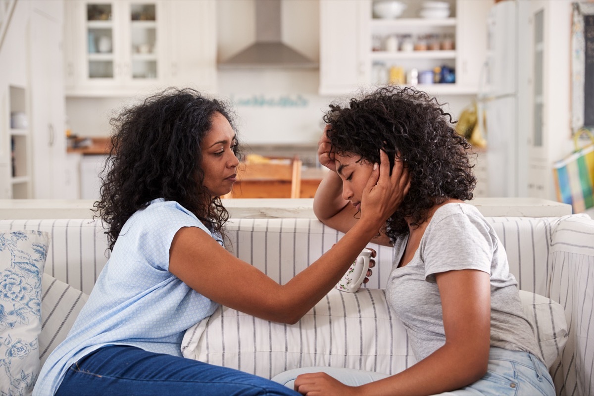 Mom caring for her upset daughter