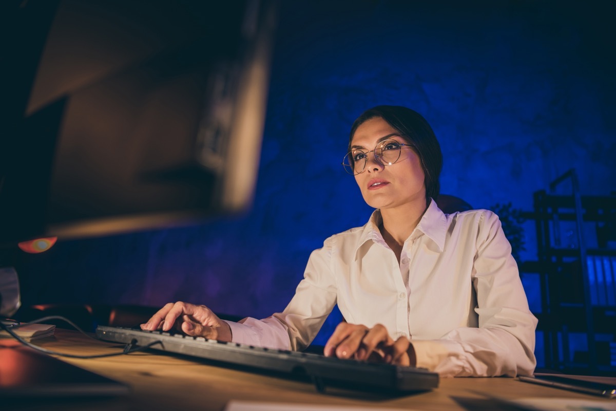 woman staying late at the office