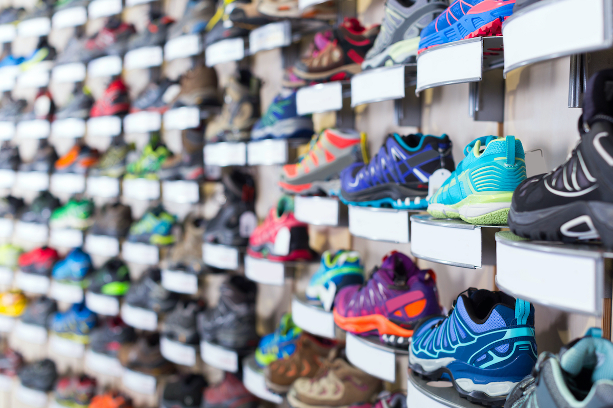 Image of shelves of the store with sport shoes.