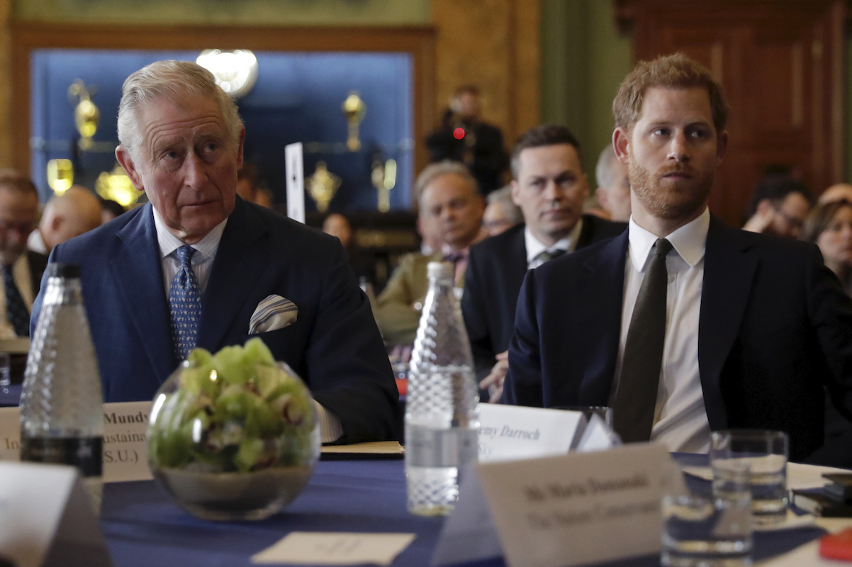 Prince Harry and Prince Charles, Prince of Wales attend the 'International Year of The Reef' 2018 meeting at Fishmongers Hall on February 14, 2018 in London.